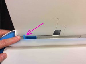 Picture of the HP Desk Jet 3632 Printer, its Adjustable Blue Paper Guide Highlighted.