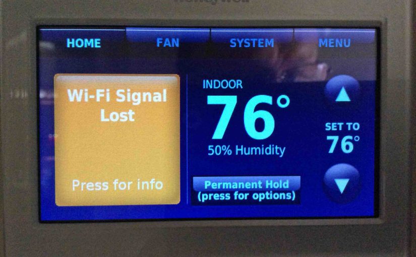 Picture of the Honeywell wireless thermostat, displaying its -Lost Wi-Fi Signal- message.