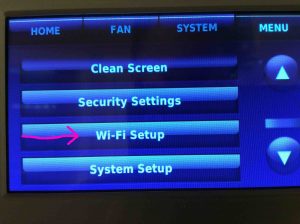 Picture of a Honeywell WiFi touchscreen thermostat, with the Wi-Fi setup option highlighted.