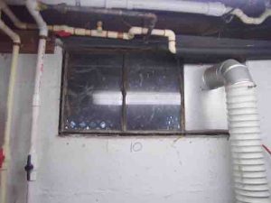 Picture of the old Basement Window 10, with the dryer vent, to be replaced.