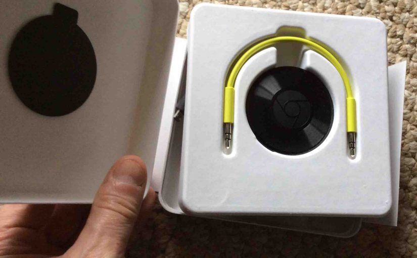 Picture of the Google Chromecast Audio receiver package, showing inner box top open.