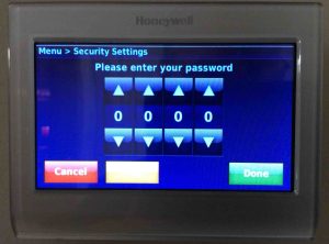 Picture of the -Please Enter Your Password- screen, with no passcode entered yet. Unlocking Honeywell Thermostat.