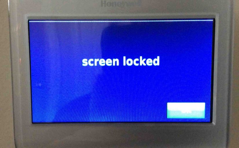 Picture of the Honeywell RTH9580WF smart thermostat, displaying its -Screen Locked- message.
