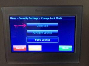 Picture of the thermostat displaying its -Security Settings- screen, with the -Unlocked- button highlighted.