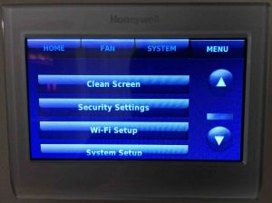 Picture of the unlocked form of its -Main Menu- screen, scrolled down to show unlocked options. Honeywell Thermostat Screen Locked.
