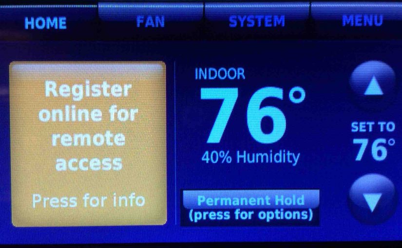 Picture of the Honeywell RTH9580WF Wi-Fi thermostat, displaying the -Register Thermostat Online- message.