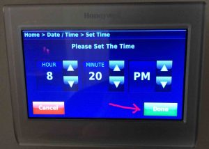 Picture of the -Please Set The Time- screen, showing the green -Done- button.