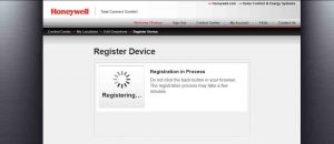 Picture of the Picture of the Honeywell Total Connect Comfort web site, displaying its -Register Device, Registration In Progress- screen.