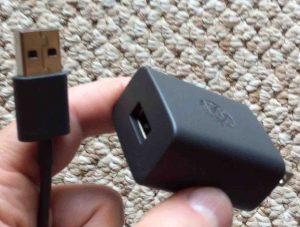 Picture of the Google Chromecast Audio receiver power supply and included USB cable.