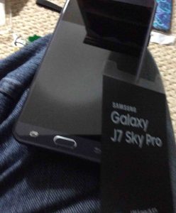 Front view picture of the phone, with screen protector removed. Samsung Galaxy J7 Picture Gallery.