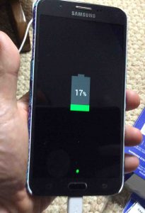 Picture of the smart phone, powered off and charging. Samsung Galaxy J7 Picture Gallery.