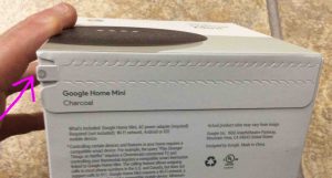 Picture of the perforated seal strip on the original box for the Google Home Mini smart speaker.