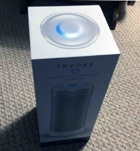 Picture of the Microsoft Invoke smart speaker, front view, new in box, outer plastic removed.