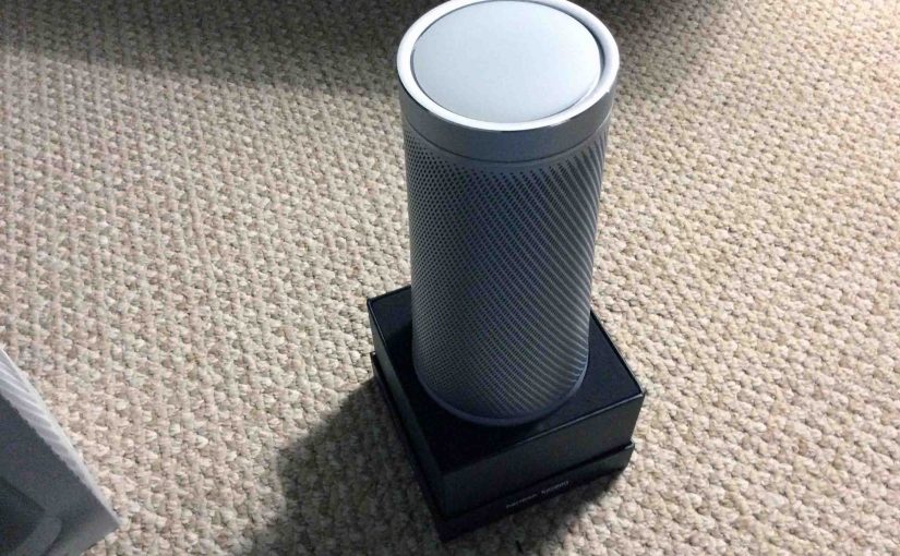 Picture of the Microsoft Invoke voice activated speaker, new in box, with the top outer shell removed.