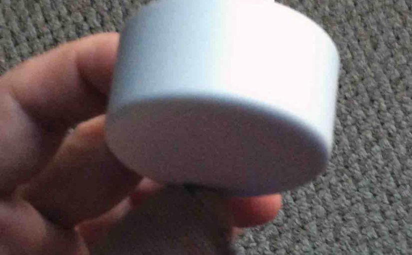 Picture of the USB power adapter for the Google Home Mini smart speaker, top view.