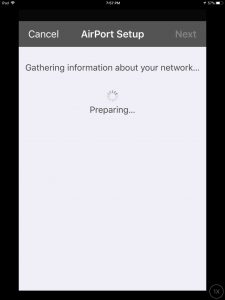 Picture of the Cortana app on iOS, displaying its -AirPort Setup, Gathering Network Information- screen.