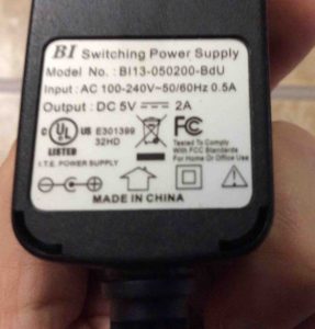 Picture of the BI model 13-050200-BDU AC power adapter, showing its label side.