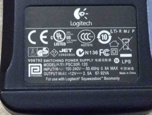 Picture of the label side of the Logitech AC power adapter, model PSC30R-120, for the Squeezebox Boom internet radio.