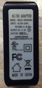 Picture of the AC Wall Adapter for the Victor Reader Trek Navigator by Shenzhen Simsukian Electronics, Showing its Label Side with Specifications.