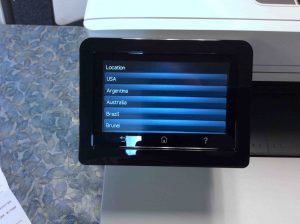 Picture of the Color Laserjet Pro M477 printer, displaying its -Location Selection- screen.
