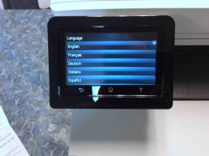 Picture of the HP Color M477 printer, displaying its -Language Selection- screen.