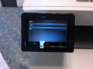 Picture of the HP LJ Pro M477 printer, displaying its -USA Location Confirmation- screen.