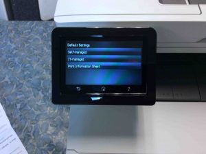 Picture of the Laserjet Pro MFP M477 printer, displaying its -Default Settings Choices- screen.