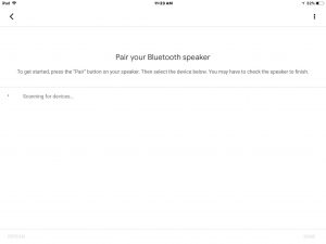Picture of the Google Home app on iOS, showing its -Pair Your Bluetooth Speaker- screen, while scanning for Bluetooth devices.