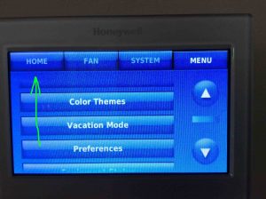 Picture of the Honeywell thermostat, showing its -Main Menu- page, with the -Home- button highlighted.