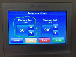 Picture of the -Temperature Range- screen on the Honeywell thermostat, showing the -Minimum Cool Limit- adjustment. 