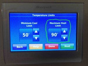Picture of the -Temperature Range- screen on the Honeywell thermostat, with the -Maximum Heat Limit- adjustment highlighted.