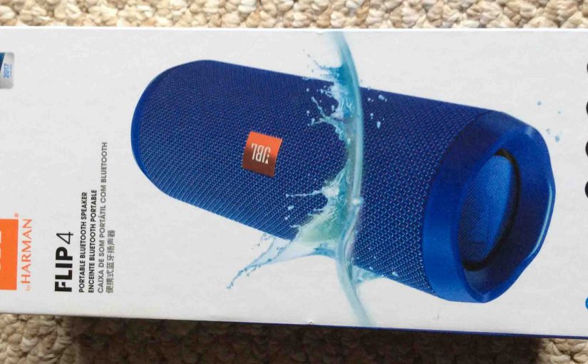 Picture of the JBL Flip 4 Bluetooth Speaker box, front view, horizontal.