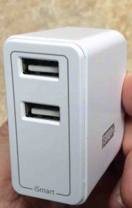 Picture of the RavPower USB dual port 24w wall charger, showing its USB port side.