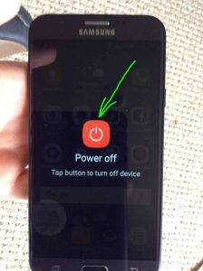 Picture of the phone's -Power Off- screen with the red -Power Off- button highlighted.
