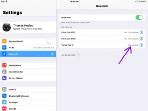 Screenshot of the iOS Bluetooth Settings screen on iPad Air, showing the -Tom's Flip 4- Bluetooth speaker connected and highlighted.