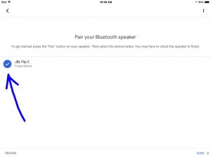 Screenshot of the Google Home app on iOS, displaying its -Pair Your Bluetooth Speaker- screen, with the JBL Flip 2 speaker discovered and checked.