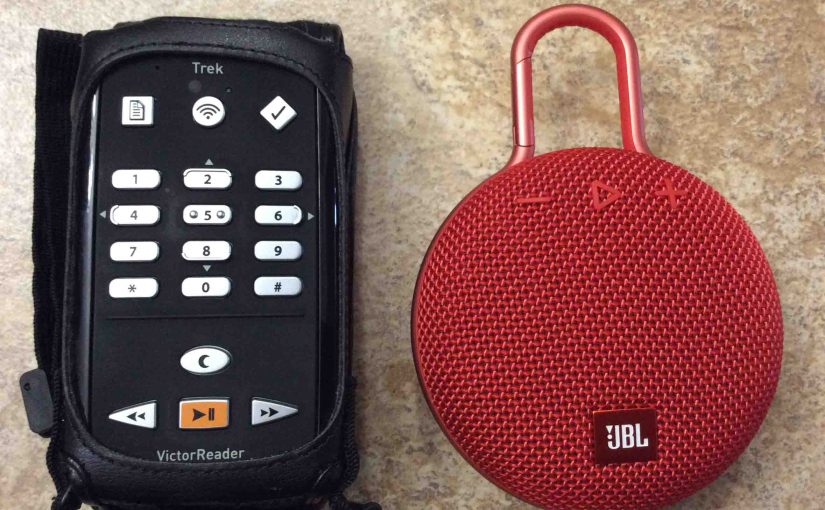 Picture of the Humanware Victor Reader Trek talking GPS player with the JBL Clip 3 Bluetooth speaker.