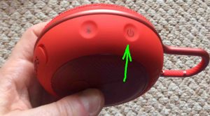 Picture of the JBL Clip 3 Bluetooth Speaker, showing its -Power- button highlighted. JBL Clip 3 Buttons.