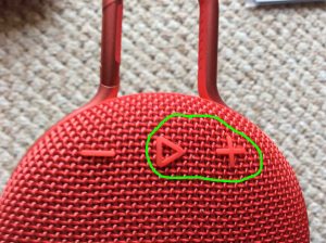 Picture of a JBL Clip 3 Bluetooth speaker reset button combination suggestion. Play-Pause and Volume Up buttons circled.