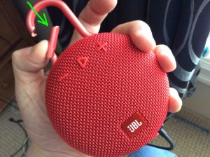 Picture of the JBL Clip 3 wireless Bluetooth speaker, front view, showing the clip held open.
