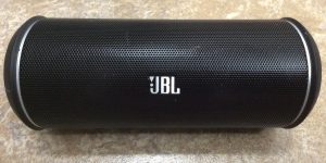 JBL Flip 2 wireless portable Bluetooth speaker picture gallery. Picture of the JBL Flip 2 portable Bluetooth speaker, front side view.