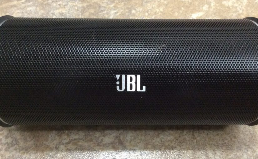 Picture of the JBL Flip 2 portable Bluetooth speaker, front side view.