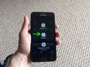Picture of the TracFone Samsung Galaxy J7 Sky Pro phone, showing its -Power Options- screen, with the -Restart- button highlighted.