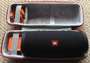 Picture of the JBL Charge 3 in an open hard shell case.