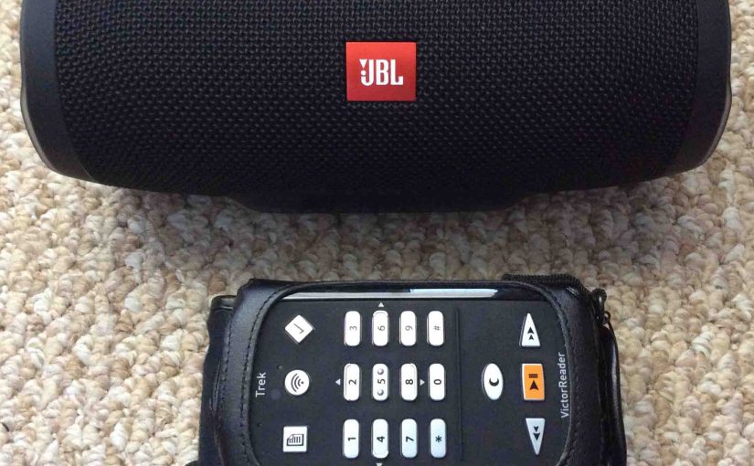 Picture of the JBL Charge 3 Bluetooth speaker with the Victor Reader Trek talking GPS media player, front view.