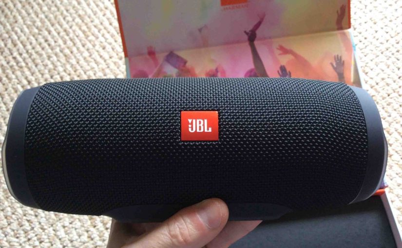 Picture of the JBL Charge 3 waterproof wireless speaker, front view, unpacked and held In hand.