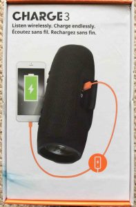 JBL Charge 3 waterproof wireless Bluetooth speaker picture gallery. Picture of the JBL Charge 3 wireless Bluetooth speaker, original packaging box, side 4. Showing connection to mobile phone for charging..