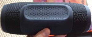 Picture of the JBL Charge 3 wireless waterproof speaker, Showing bottom view, the built in pedestal that the speaker sits on. 