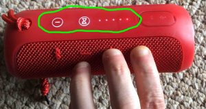 Picture of the JBL Flip 3 Bluetooth speaker, showing the light pattern as seen during factory default reset.