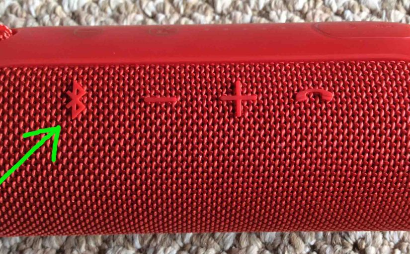 Picture of the JBL Flip 3 wireless speaker. Showing its Bluetooth pairing button highlighted.